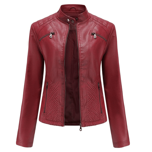 A red leather motorcycle jacket with a mandarin collar, zipper details, and quilted design on the chest.