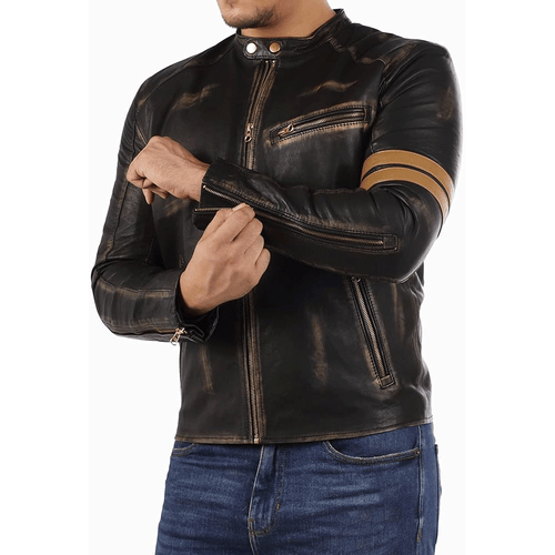 A man wearing a black leather motorcycle jacket with a distinctive orange stripe design, featuring pockets at the elbows and shoulders, and leather accents.